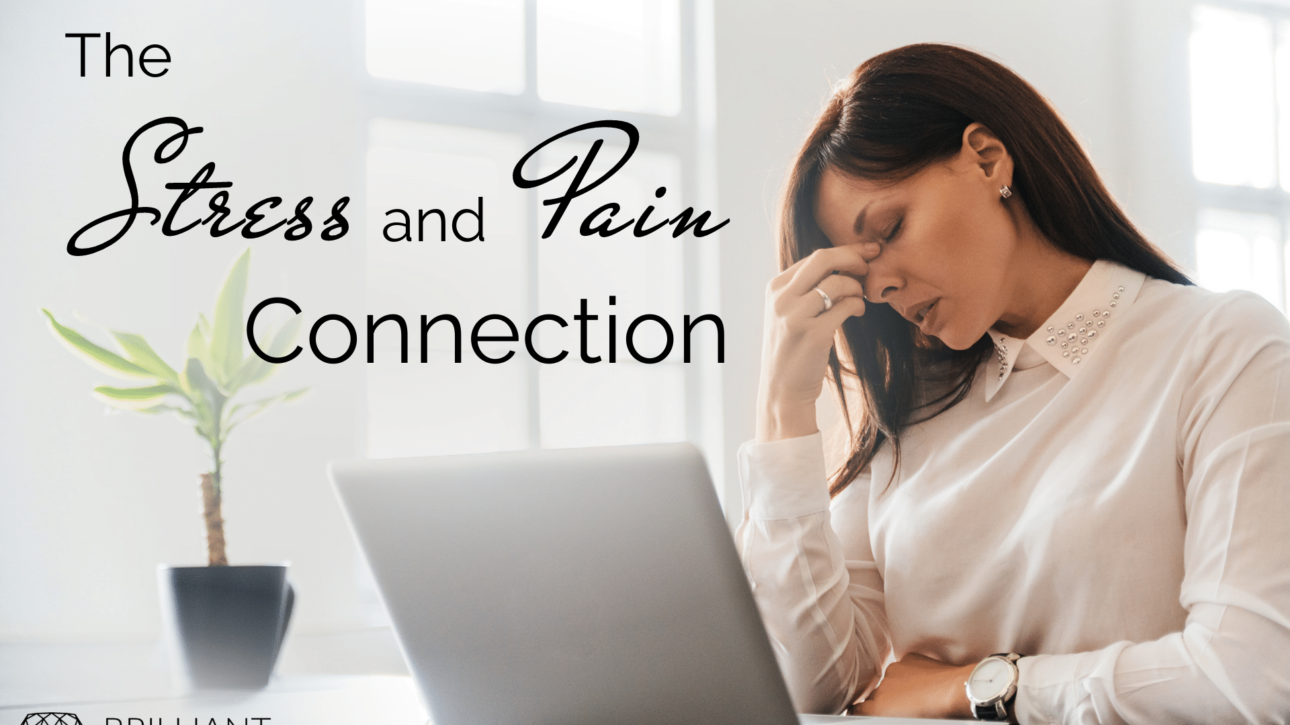 Girl in office suit in front of a laptop holding her nostril, like feeling stress: text: the stress and pain connection