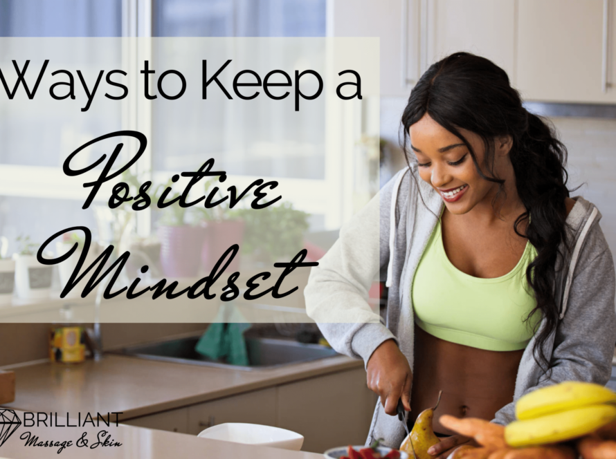 a smiling girl in yellow sport wear and gray jacket preparing fruits and vegetables on kitchen countertop: text: ways to keep a positive mindset