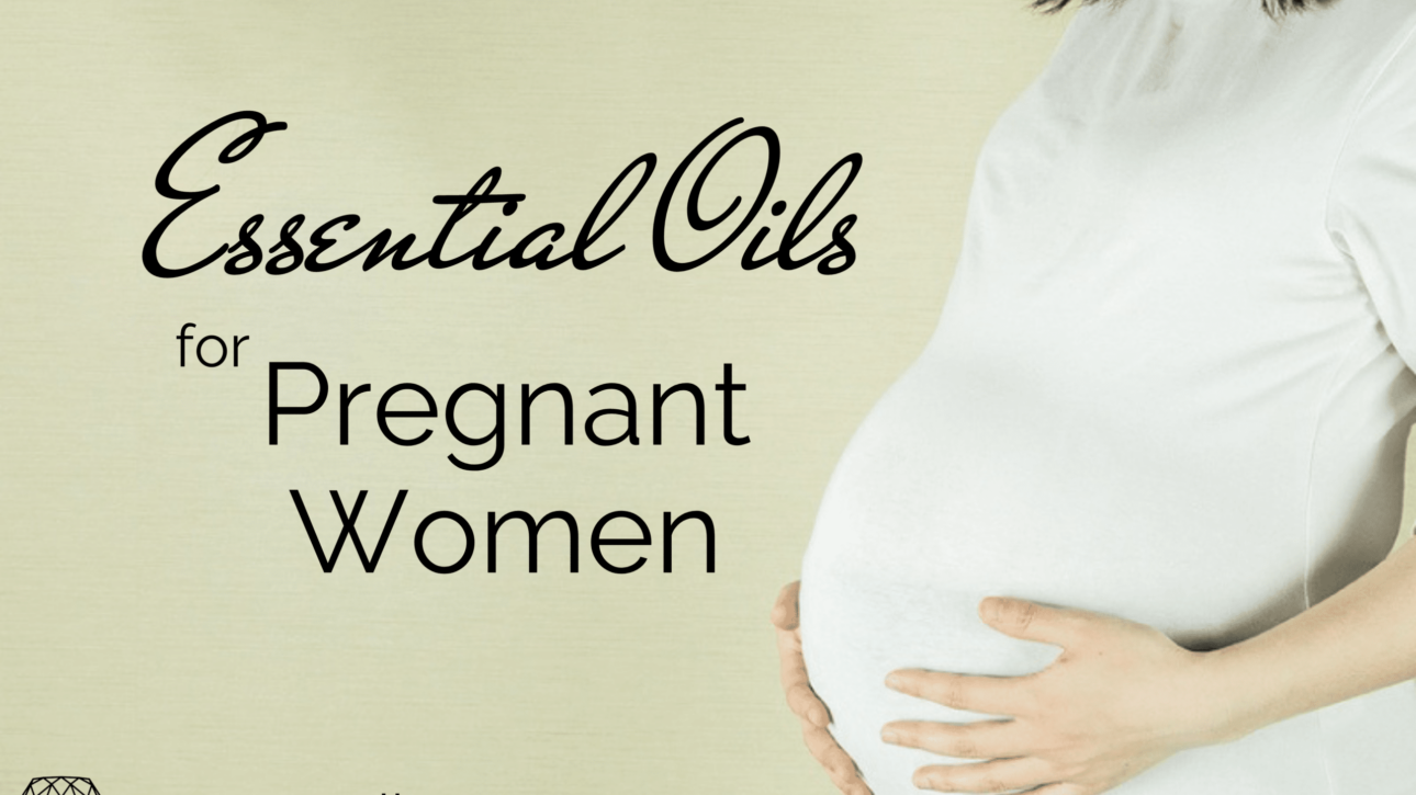 pregnant woman in white shirt while holding her tummy: text: essesntial oils for pregnant women