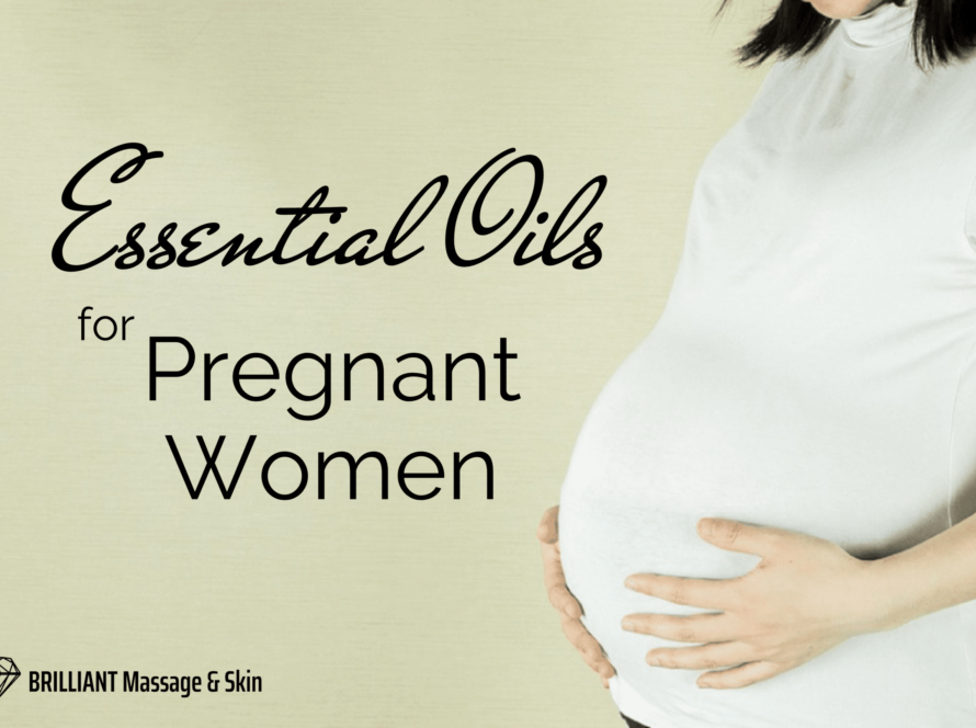 pregnant woman in white shirt while holding her tummy: text: essesntial oils for pregnant women