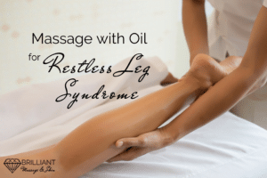 a massage therapist giving an oil massage to a leg: text: massage with oil for restless leg syndrome